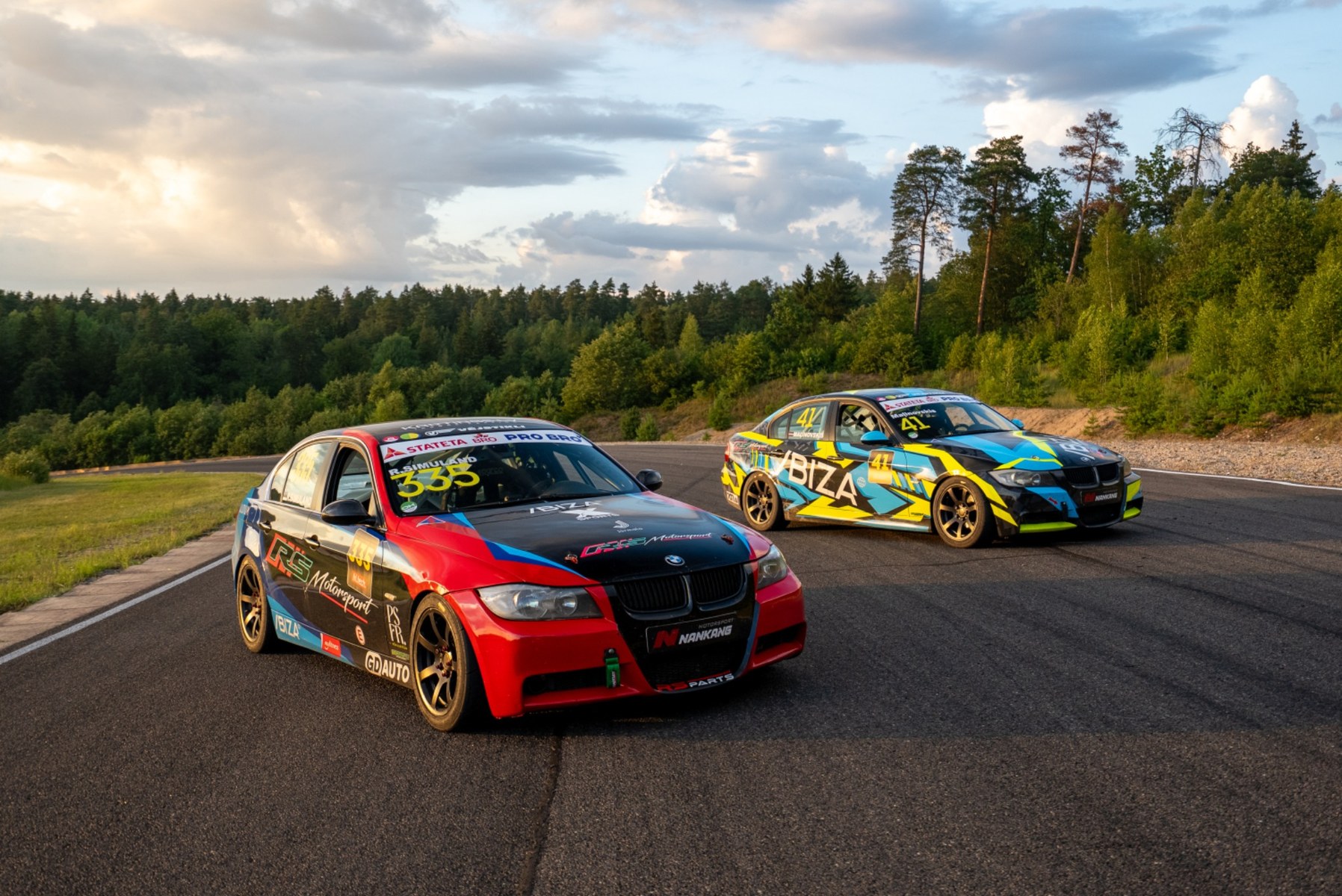 Racing cars at sunset